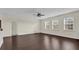Bonus room with hardwood floors and multiple windows at 19206 Robertson St, Orlando, FL 32833