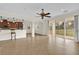 Open floor plan kitchen and Gathering room with view to backyard at 19206 Robertson St, Orlando, FL 32833