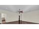 Main bedroom with hardwood floor and ensuite bathroom at 19206 Robertson St, Orlando, FL 32833