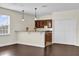 Wet bar with wood cabinets and granite countertop at 19206 Robertson St, Orlando, FL 32833