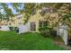 Backyard with grassy area, and sliding glass door access at 3006 Seaview Castle Dr, Kissimmee, FL 34746