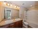 Clean bathroom with double sinks and bathtub at 3006 Seaview Castle Dr, Kissimmee, FL 34746