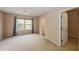 Spacious bedroom with carpeting, ceiling fan, and large window at 3006 Seaview Castle Dr, Kissimmee, FL 34746