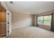 Bedroom with carpet, ceiling fan and window at 3006 Seaview Castle Dr, Kissimmee, FL 34746