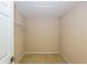 Walk-in closet with wire shelving and carpeted floor at 3006 Seaview Castle Dr, Kissimmee, FL 34746
