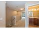 Upstairs hallway with access to bathroom and bedroom at 3006 Seaview Castle Dr, Kissimmee, FL 34746