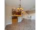 Open concept kitchen and dining area with chandelier at 3006 Seaview Castle Dr, Kissimmee, FL 34746