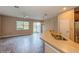 Kitchen with breakfast bar and double sink at 3006 Seaview Castle Dr, Kissimmee, FL 34746