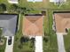 Aerial view of house highlighting its roof and surrounding landscape at 552 Eagle Ct, Poinciana, FL 34759
