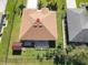 Aerial view of house with backyard and shed at 552 Eagle Ct, Kissimmee, FL 34759