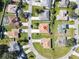 Aerial view of house in residential neighborhood at 552 Eagle Ct, Poinciana, FL 34759