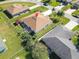 Aerial view of house and surrounding neighborhood at 552 Eagle Ct, Poinciana, FL 34759