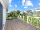 Backyard patio with tile flooring and white railings at 552 Eagle Ct, Poinciana, FL 34759