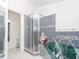 Bathroom with shower, bathtub, and tile surround at 552 Eagle Ct, Poinciana, FL 34759