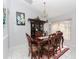 Dining room features a large wooden table and hutch at 552 Eagle Ct, Poinciana, FL 34759