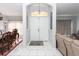 Spacious entryway with tile floors and double doors at 552 Eagle Ct, Poinciana, FL 34759