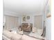 Bright living room featuring a neutral color palette and comfortable seating at 552 Eagle Ct, Poinciana, FL 34759