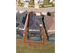 Property featuring a pool and solar panels; aerial view at 8956 Hilton Ridge Ave, Kissimmee, FL 34747
