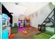 Fun game room with various arcade games and a seating area at 8956 Hilton Ridge Ave, Kissimmee, FL 34747