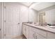 Modern bathroom with double sinks and a large vanity at 8956 Hilton Ridge Ave, Kissimmee, FL 34747