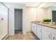 Bathroom with double sinks and a walk-in shower at 8956 Hilton Ridge Ave, Kissimmee, FL 34747