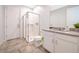 Clean bathroom with a shower, toilet and vanity at 8956 Hilton Ridge Ave, Kissimmee, FL 34747