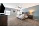 Spacious main bedroom with a large bed and plenty of light at 8956 Hilton Ridge Ave, Kissimmee, FL 34747
