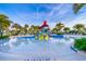Refreshing community pool with a fun water playground for  at 8956 Hilton Ridge Ave, Kissimmee, FL 34747