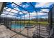 Private pool and spa with screened enclosure at 8956 Hilton Ridge Ave, Kissimmee, FL 34747