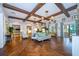 Elegant lobby with hardwood floors, comfortable seating, and a stylish chandelier at 8956 Hilton Ridge Ave, Kissimmee, FL 34747