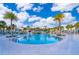 Resort-style pool with plenty of lounge chairs and umbrellas at 8956 Hilton Ridge Ave, Kissimmee, FL 34747