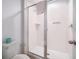 Clean bathroom with a spacious walk-in shower at 8956 Hilton Ridge Ave, Kissimmee, FL 34747
