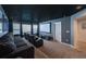Home theater with large screen and comfortable seating at 8956 Hilton Ridge Ave, Kissimmee, FL 34747