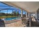 Covered patio with pool view and outdoor furniture at 8956 Hilton Ridge Ave, Kissimmee, FL 34747