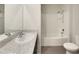 Bathroom with shower/tub combo, double vanity, and tile floor at 127 Hickory Crse, Ocala, FL 34472