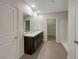 Bathroom with shower, double vanity, and tile floor at 127 Hickory Crse, Ocala, FL 34472