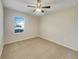 Spacious bedroom with carpeted floor and ceiling fan at 127 Hickory Crse, Ocala, FL 34472