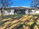 Single story home with screened porch at 127 Hickory Crse, Ocala, FL 34472