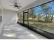 Bright screened porch with view of backyard at 127 Hickory Crse, Ocala, FL 34472