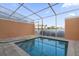 Private screened-in pool area with tiled decking at 1511 Still Dr, Clermont, FL 34714