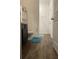 Clean bathroom with dark vanity, toilet and shower at 16344 Blooming Cherry Dr, Groveland, FL 34736