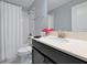 Bathroom with single vanity and shower/tub combo at 1680 Moon Valley Dr, Davenport, FL 33896
