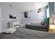 Bedroom with two twin beds, Frozen themed wall, and TV at 1680 Moon Valley Dr, Davenport, FL 33896