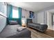Bedroom with two twin beds and Frozen themed wall at 1680 Moon Valley Dr, Davenport, FL 33896