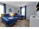 Twin bedroom with fun wall art and plenty of space at 1680 Moon Valley Dr, Davenport, FL 33896