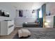 Bedroom with two twin beds, Frozen themed wall, and TV at 1680 Moon Valley Dr, Davenport, FL 33896