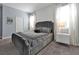 Spacious bedroom with a large bed and nightstands at 1680 Moon Valley Dr, Davenport, FL 33896