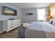 Spacious bedroom with king-size bed and a large TV at 1680 Moon Valley Dr, Davenport, FL 33896