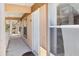 Condo hallway with access to unit and balcony view at 2711 Emerald Lake Ct, Kissimmee, FL 34744