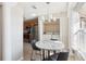 Bright kitchen features stainless steel appliances and wood cabinets at 2711 Emerald Lake Ct, Kissimmee, FL 34744